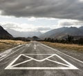 Email sign on asphalt road Royalty Free Stock Photo