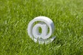 Email sign on green grass Royalty Free Stock Photo