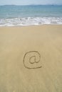 Email symbol draw on beach Royalty Free Stock Photo