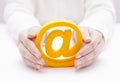 Email symbol protected by hands