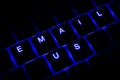 'Email Us' Illuminated Keyboard Text in Blue Royalty Free Stock Photo