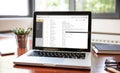 Emails list on a laptop screen, office workspace Royalty Free Stock Photo