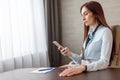 Attractive business woman wearing spectacles and blank badge at office Royalty Free Stock Photo