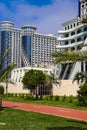 Embankment of Batumi with alley of palm trees, bicycle path and modern architecture Royalty Free Stock Photo