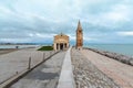 Embankment in Caorle with the church, day foto