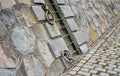 The embankment in the dock shore is fortified by a sloping retaining wall of kykop masonry. Roughly worked stones stabilize the sh