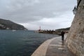 Embankment of the entrance to the old port of Dubrovnik on a cloudy day Royalty Free Stock Photo