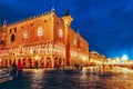 Embankment of the Grand Canal and the Doge`s Palace Palazzo Ducale in night time, Venice. Italy Royalty Free Stock Photo