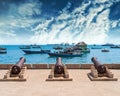 Embankment with guns in Zanzibar Stone Town with ocean on the ba