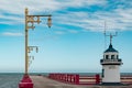 Embankment with lanterns and watchtower Royalty Free Stock Photo