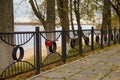 Embankment with a metal fence with locks of love Royalty Free Stock Photo