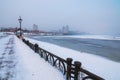 Embankment at the Obolon district in Kyiv, Ukraine. A dangerous hobby - winter fishing. Royalty Free Stock Photo