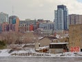 Embankment of Ottawa river with old industrial buildings, church and skyscrapers in Gatineau, Quebec, Canada