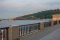 Embankment overlooking the pedestrian bridge at sunset, Ukraine, Kyiv. Editorial. 08.03.2017