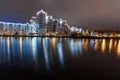 Embankment of Svisloch river with Island of Courage and Sorrow or Ostrov Slyoz at night. Minsk. Belarus Royalty Free Stock Photo