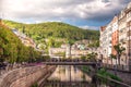 The embankment of Tepla river in the center of Karlovy Vary, Czech republic Royalty Free Stock Photo