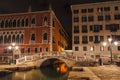 Embankment to the bridge near Palace of the doges and the palazzo delle Prigioni at night. Venice, Italy