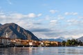 Embankment of the town of Menaggio against the backdrop of mountains. Lake Como, Italy Royalty Free Stock Photo