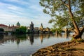 Embankment of the Vltava River with a view of the Charles Bridge in Prague, Czech Republic Royalty Free Stock Photo