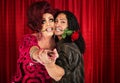 Embarrassed Man Dancing with Transvestite Royalty Free Stock Photo