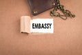 Embassy. Inscription in window of torn paper