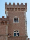 Embattled Tower of the Medieval Castle at the Entrance to the Village of Bolgheri Royalty Free Stock Photo