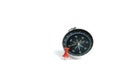 Embedded red thumbtack / pushpin with compass isolated on white background Royalty Free Stock Photo