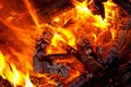 Embers glowing in blazing fire Royalty Free Stock Photo