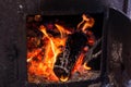 Embers of Tradition: Crackling Hearth Close-Up