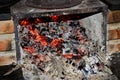 The ember in the wood stove from the burnt woods Royalty Free Stock Photo