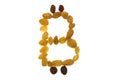 Emblem of bitcoin from raisins, on white isolated background