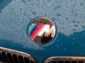 April 11, 2013, Kiev Ukraine. Emblem BMW `M` Series, in the drops of rain