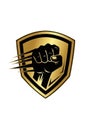 An emblem featuring a stylized black fist with extended claws set against a gold Royalty Free Stock Photo