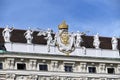 Emblem with golden crown at the top of the building Vienna