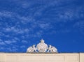 Emblem with griffins and crown at the top of the building Vienna