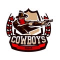 Emblem, logo, cowboy shooting from two revolvers. Wild west, a thug, Texas, a robber, a sheriff, a criminal, a shield Royalty Free Stock Photo