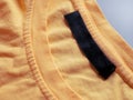 The emblem is missing from the clothing, an empty tag for the logo, copy space Royalty Free Stock Photo