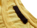 The emblem is missing from the clothing, an empty tag for the logo, copy space Royalty Free Stock Photo