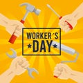 Emblem workers day and hands with construction tools