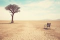 Emblems of solitude: an empty chair and a lone tree on barren land Royalty Free Stock Photo