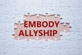 Embody Allyship symbol. Concept word Embody Allyship on white puzzle. Beautiful pink background. Business and Embody Allyship
