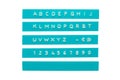 Embossed alphabet on cyan plastic tape