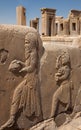 Embossed Bas Relief Carvings in Front of Tachara Palace Ruins in Persepolis Royalty Free Stock Photo