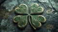 Embossed Four Leaf Clover on Dark Stone Royalty Free Stock Photo