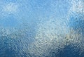 Embossed glass texture wallpaper. Uneven glass surface background image. Window oak bark patern. Relief windowpane pattern. Closeu