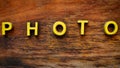 Embossed Photo Sign on Wood Royalty Free Stock Photo