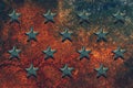 Embossed USA star shapes on rusty metal surface Royalty Free Stock Photo