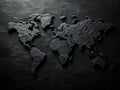 Embossed World Map on Dark Textured Surface Royalty Free Stock Photo