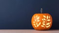 Embrace elegance this Halloween with minimalist pumpkin carving soft floral patterns, glowing warmly on a rustic table Royalty Free Stock Photo