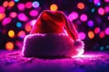 Christmas hat on the floor with bright lights around, xmas wallpaper